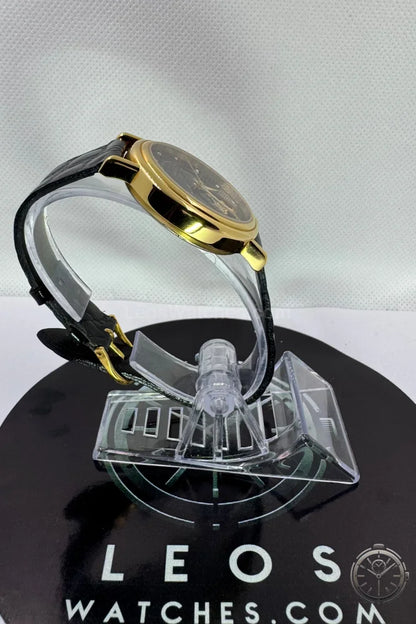 vista laterale Orologio Caravelle Open Heart