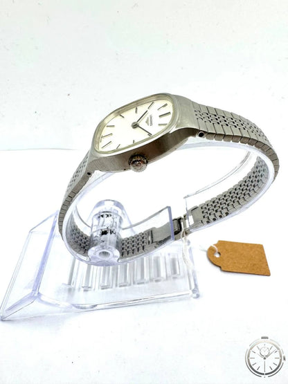 Longines Vintage '70 Donna — Vista laterale con bracciale integrato e chiusura deployante