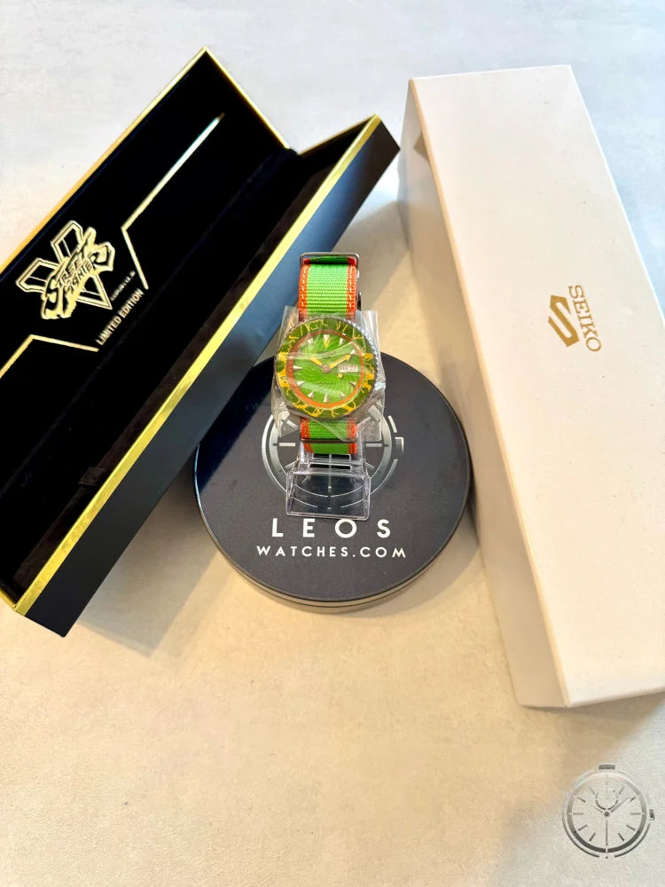 orologio Seiko 5 Sports Street Fighter V Limited Edition – Blanka SRPF23 tra confezione e controscatola originali