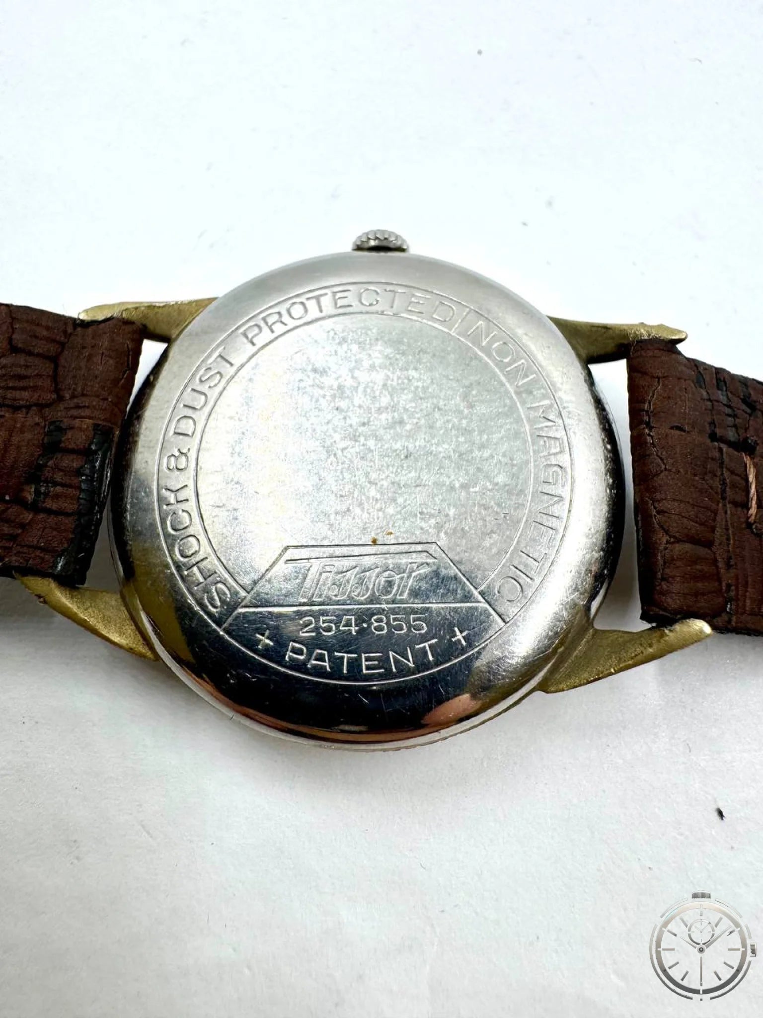 Tissot Ref. 254.855 — Fondello inciso Shock & Dust Protected Non Magnetic ref. 254.855 Patent